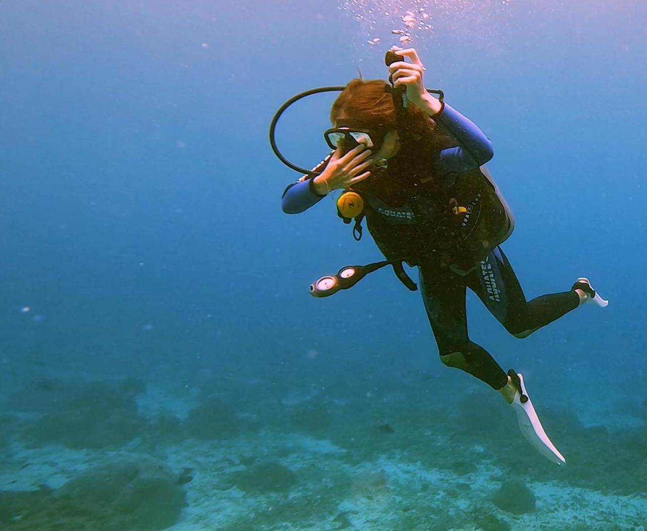 Scuba diving over a reef